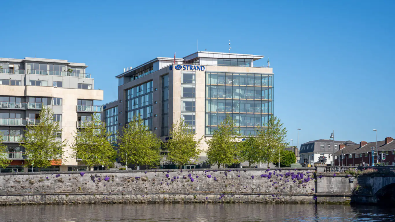 Modern multi-story hotel building labeled