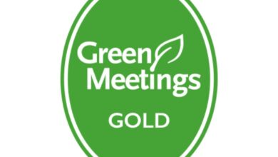 A green oval badge with the words