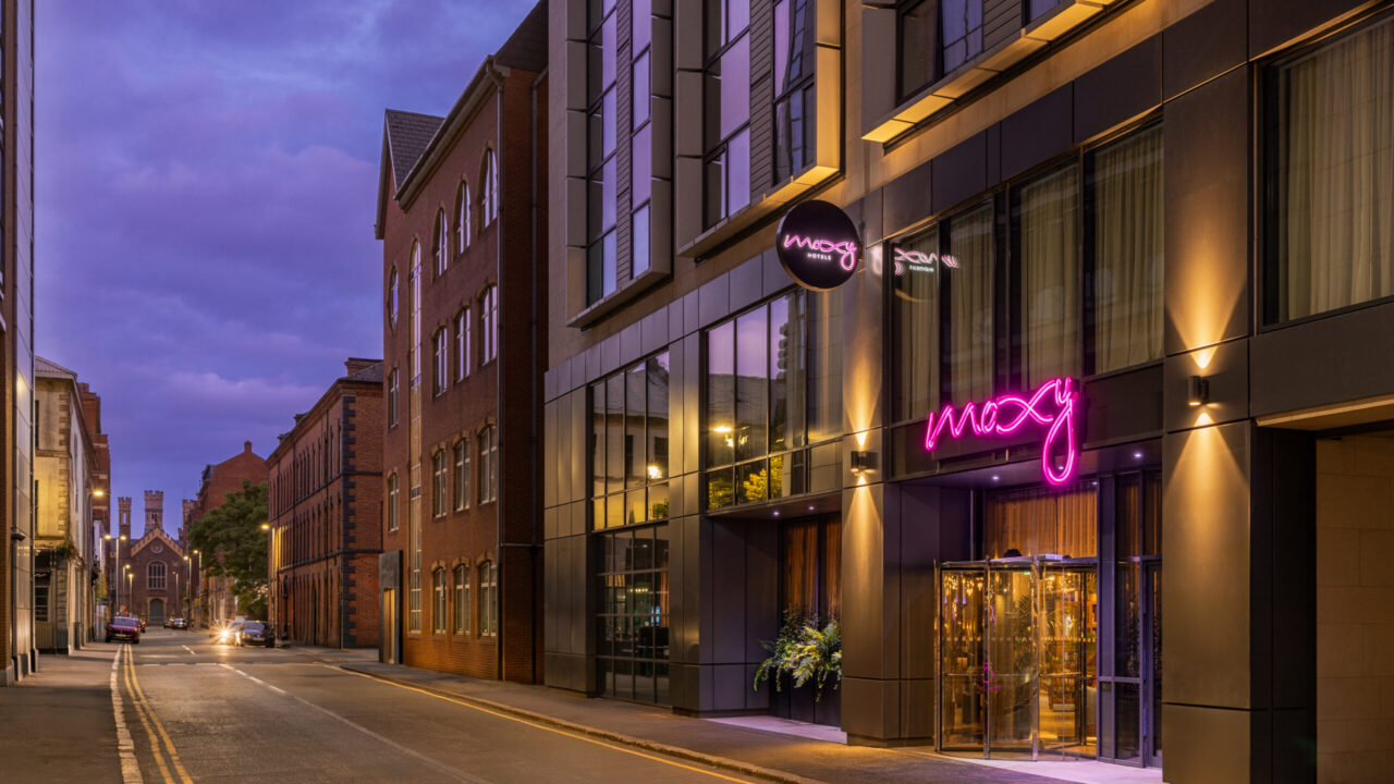 A modern hotel with a neon